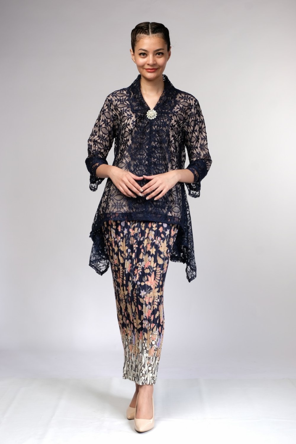 Elegant Navy Kebaya with Silver Flower Brooch