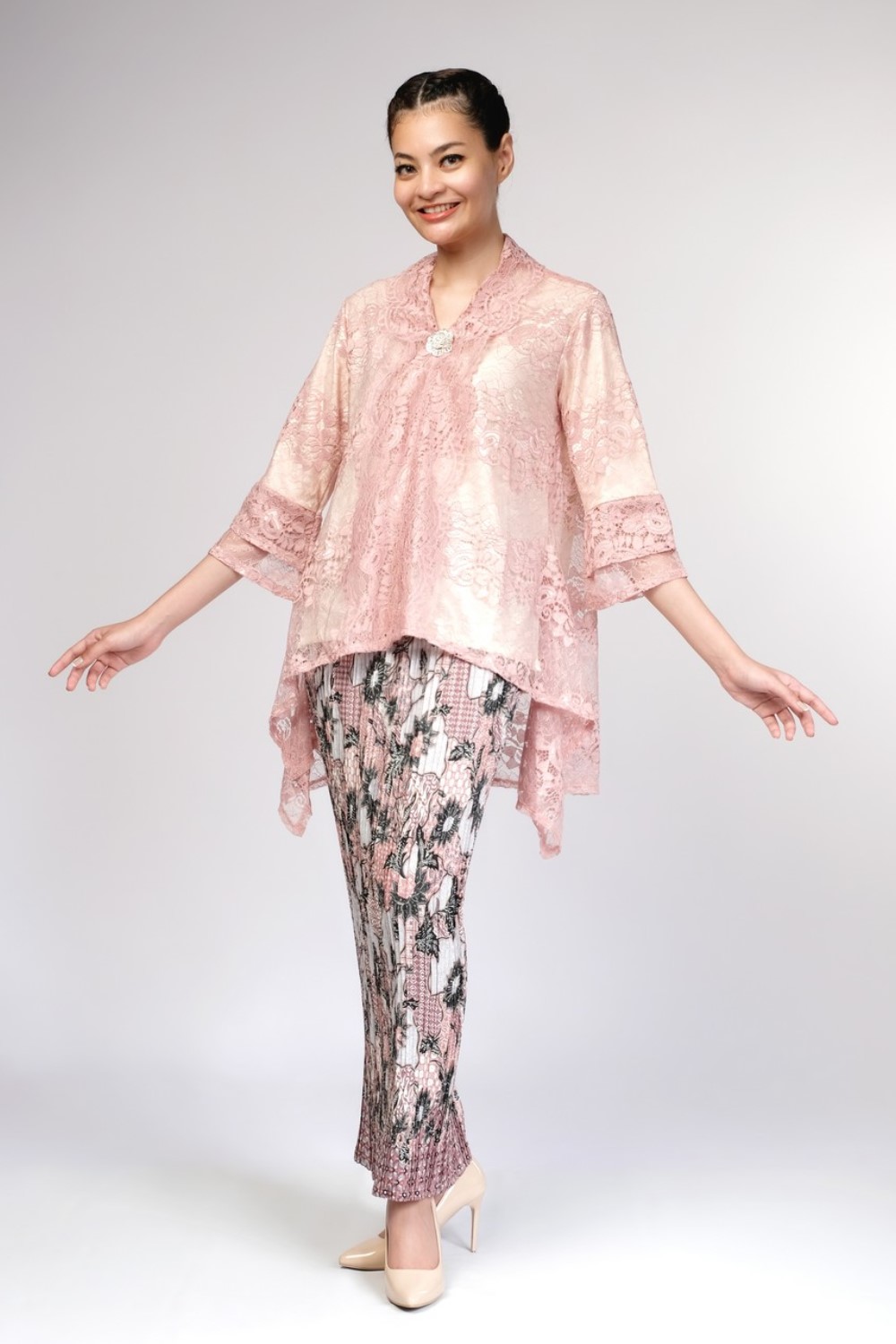 Elegant Pink Kebaya with Silver Flower Brooch